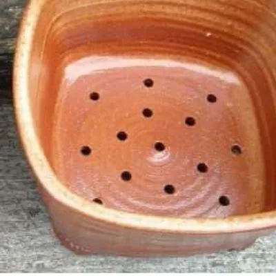 pot with drainage holes